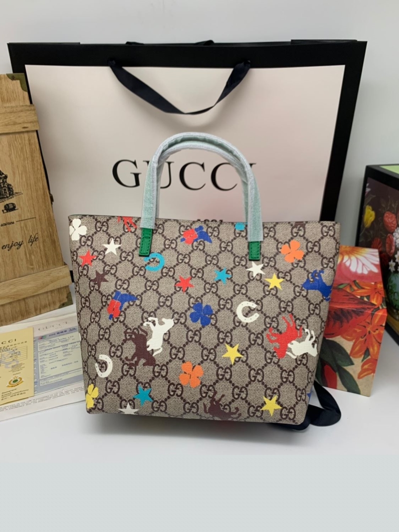 G*u*i shopping bags